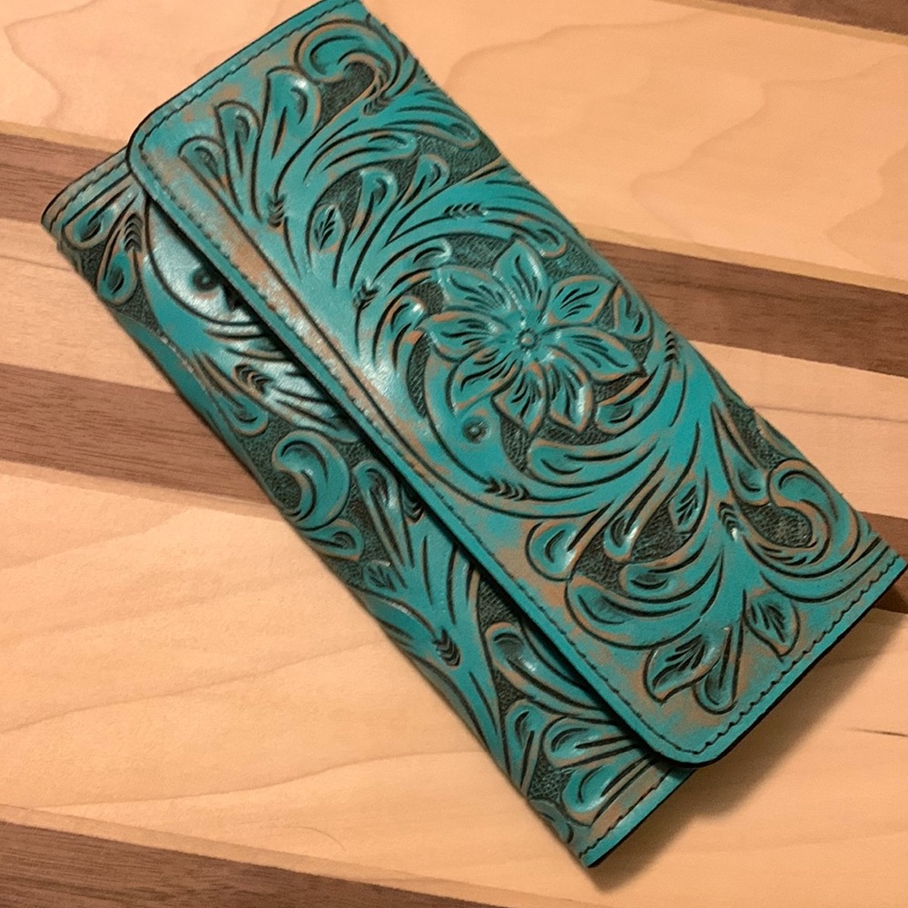 Turquoise hand tooled wallet